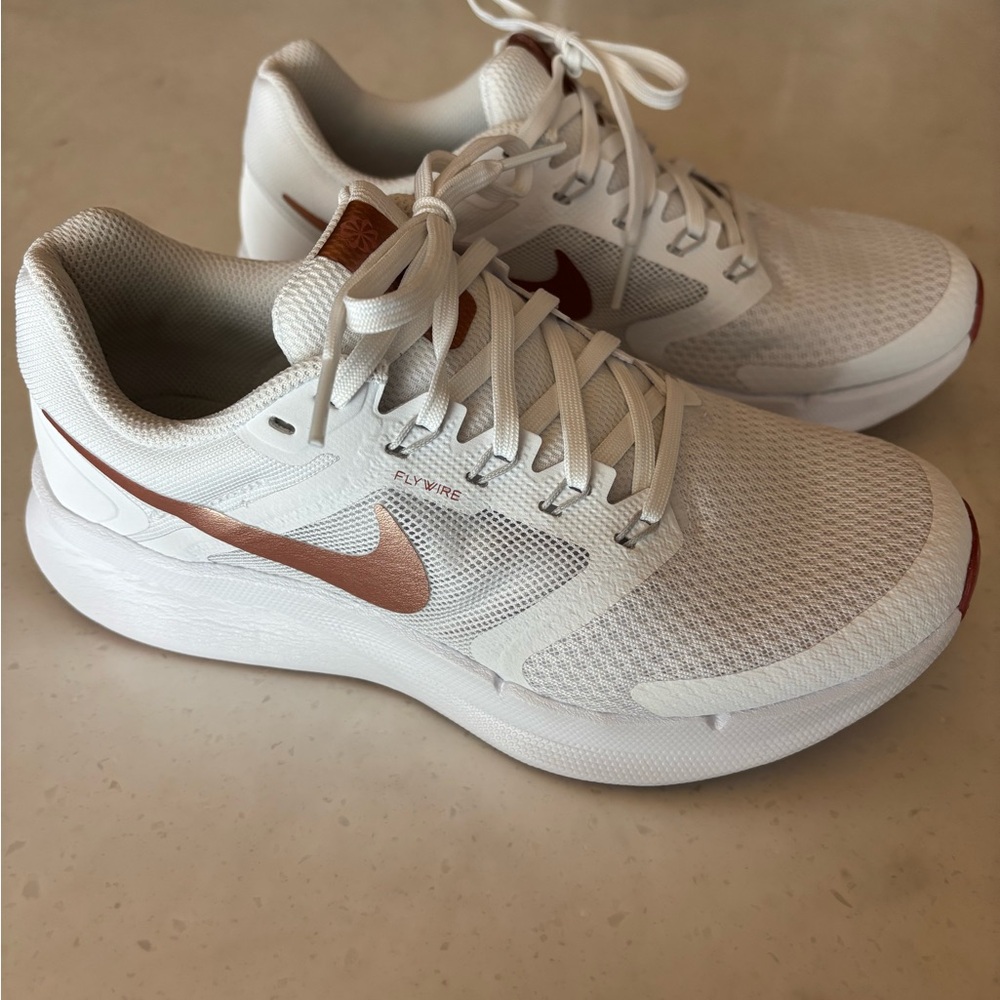 Nike run swift 3 running shoe. White and gold. Size 6.5 wide.